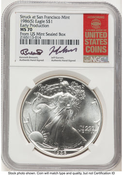 1986-(S) Silver Eagle Early Production Kenneth Bressett/Jeff Garrett Red Book From US Mint Sealed Box NGC MS70